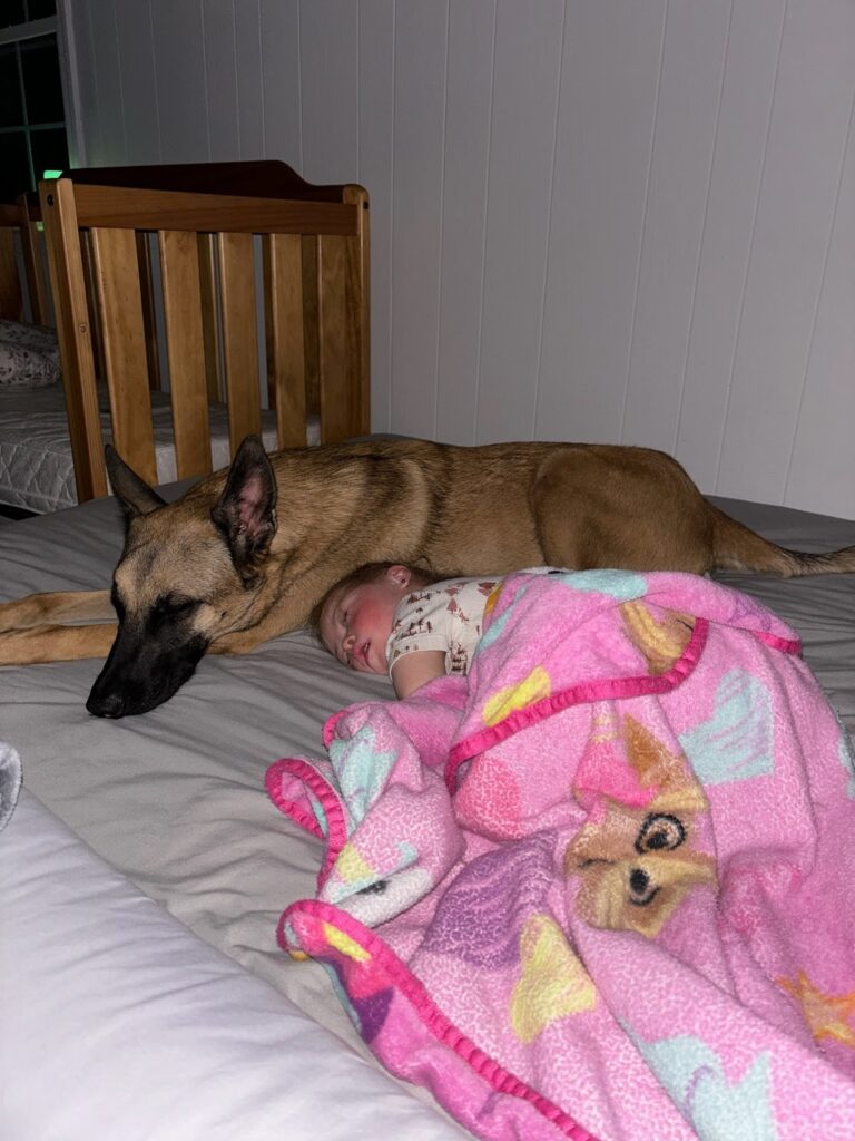 Dirp and his adopter laying down.